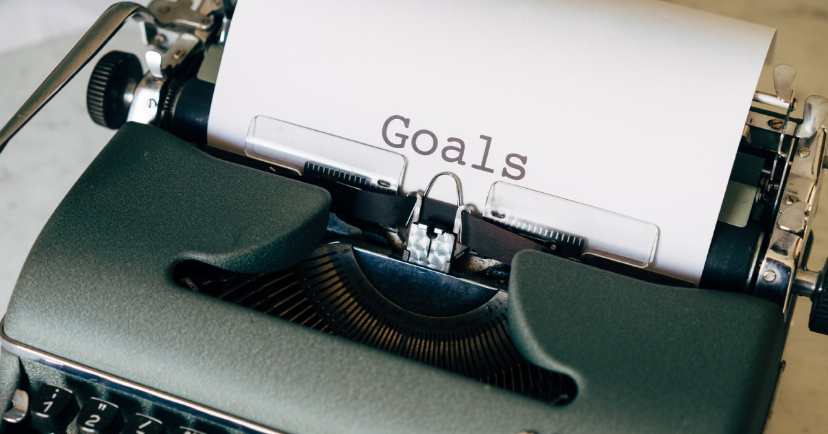 Goals written on typewriter